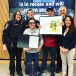 Members of the Bothell Police Department and Deputy Mayor Davina Duerr pose with Beca Nistrian and Will Tinkham after the city made its proclamation for Cup of Kindness Day on May 1. Photo via Twitter