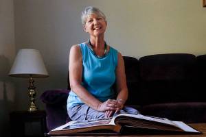 Snohomishs Janette Huskie, who worked two years as a Buckingham Palace housemaid and met the future Princess Diana, gets out her scrapbook of memories and talks about Saturdays royal wedding. (Dan Bates / The Herald)