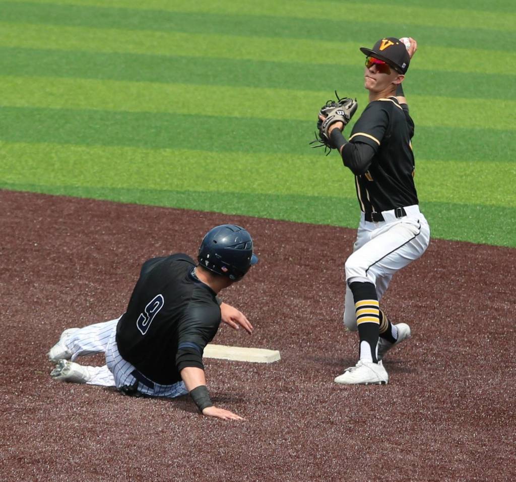 Second baseman Sean Kauffman forces a runner out. Andy Nystrom / staff photo