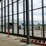 The passenger terminal at Paine Field in Everett features large windows that look out to the airport. (Janice Podsada / The Herald) PHOTO TAKEN 20180517