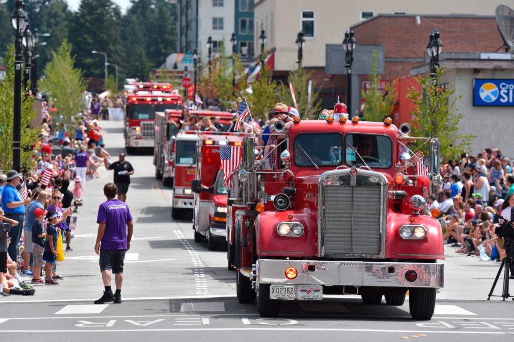 Fire trucks line up in downtown Bothell for the July 4 parade. Photo courtesy of Greg Nelson