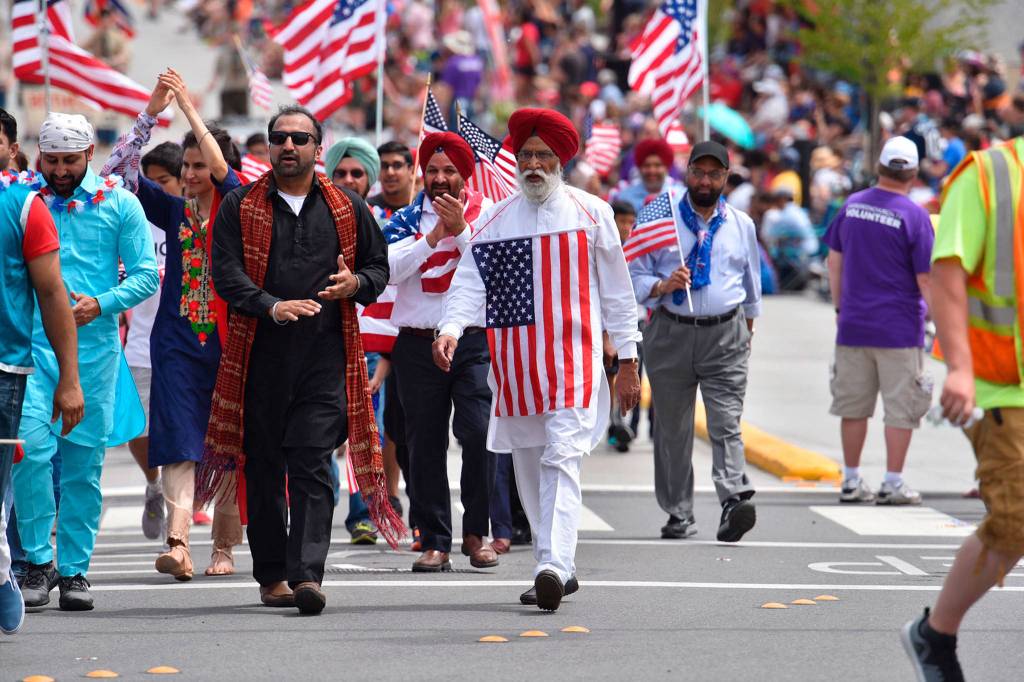 Members of Sikh Centre of Seattle march in Bothells Freedom Festival Parade. Photo courtesy of Greg Nelson