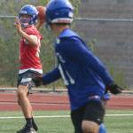 Erik Bainter lines up a pass with a receiver down field. Andy Nystrom / staff photo