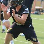 Inglemoor junior Brayden Costilla prepares for a hit during practice on Aug. 16. Hes a wrecking machine, said head coach Steve Hannan. Andy Nystrom / staff photo