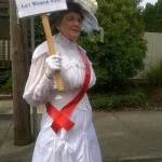 Sharon Rickets dresses as a 1920s suffragette to honor the women who fought for the right to vote. Courtesy of the Bothell Historical Museum