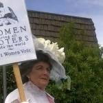 Sharon Rickets dresses as a 1920s suffragette to honor the women who fought for the right to vote. Courtesy of the Bothell Historical Museum