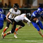 Bothells Mason Locknane evades an Inglemoor defender during the Cougars 38-14 win on Oct. 18 at Pop Keeney Stadium. Photo courtesy of Greg Nelson