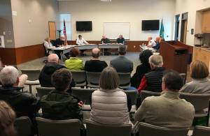 The Northshore Fire Departments Board of Commissioners discusses its compensation policy at its April 3 meeting in Kenmore. Katie Metzger/staff photo