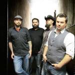 Colossal Boss. From left: Ted Norris, Cory Olsen, Fraser Midstokke and Steve Antonsen. Photo courtesy of Colossal Boss Facebook page.