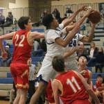 Bothell and Newport players battle for a rebound during a 4A KingCo matchup on Dec. 4 at Bothell High. Newport won, 74-72. Andy Nystrom / staff photo