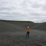 Scott Barden stands at the bottom of the massive pit of the landfills newly-built eighth section. Work on the new section has been underway for around two years. Photo by Aaron Kunkler