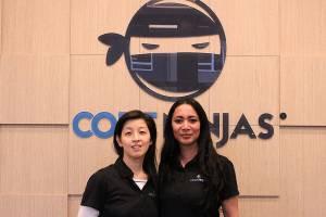 From left, Clara Ling (franchise owner) and Daisy Quitugua (center director) at the soft opening of Code Ninjas on Feb. 1. Madison Miller/staff photo