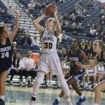 Inglemoors Abby Haller shoots the ball while surrounded by Rogers defenders at the 4A state tournament on Feb. 27 at the Tacoma Dome. Andy Nystrom / staff photo
