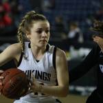 Viking Lucy Young drives to the hoop. Andy Nystrom / staff photo