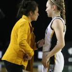 Viking coach Kristina Schumacher speaks with Lucy Young. Andy Nystrom / staff photo