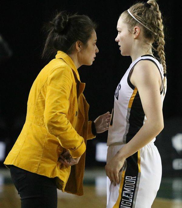 Viking coach Kristina Schumacher speaks with Lucy Young. Andy Nystrom / staff photo