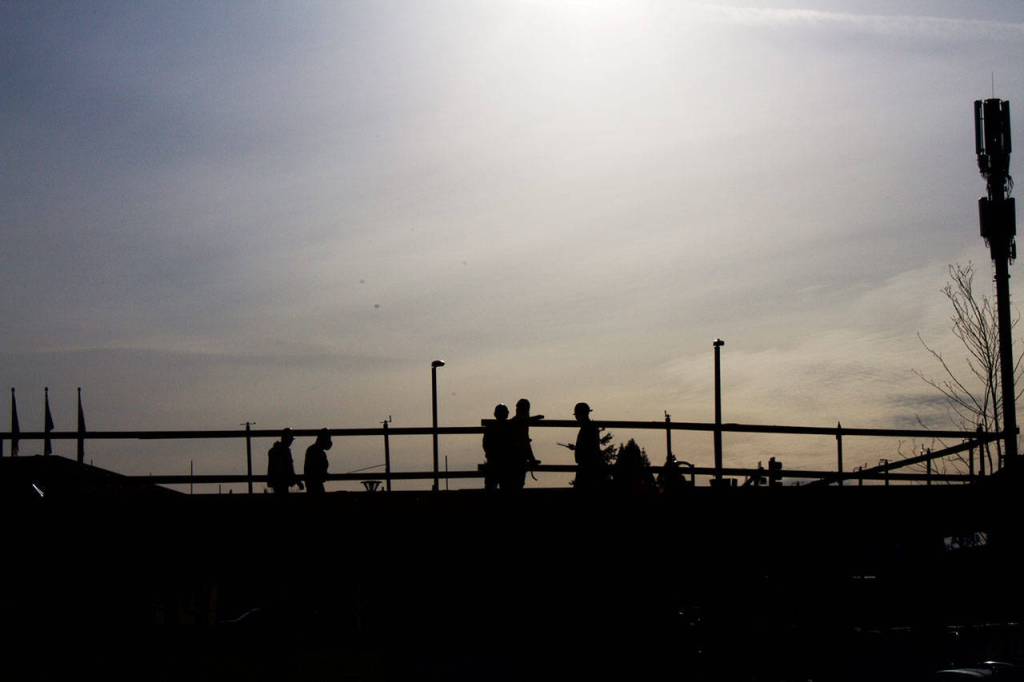 Work crews construct the first floor of Kenmores newest downtown development, the Flyway. The building is adjacent to the Hangar, Kenmores community center, and will be a mixed retail and residential space.