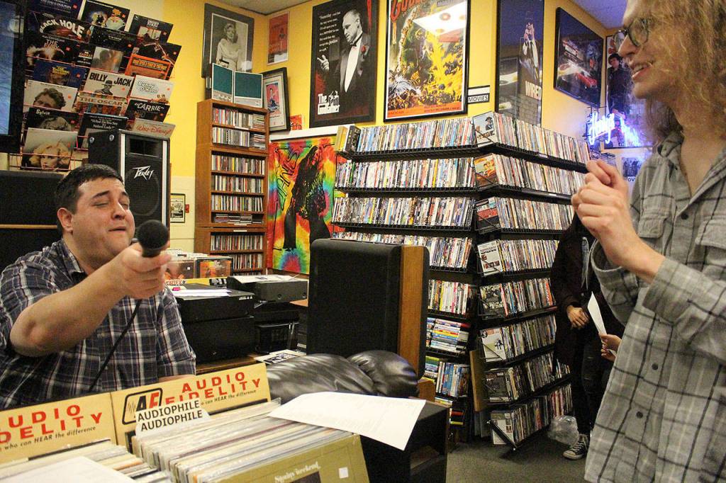 Brandon Yancey (Ron Hexagon) lip syncs to Out of the Races and Onto the Tracks by The Rapture with Thomas Carson (Trees and Flowers). Madison Miller / staff photo