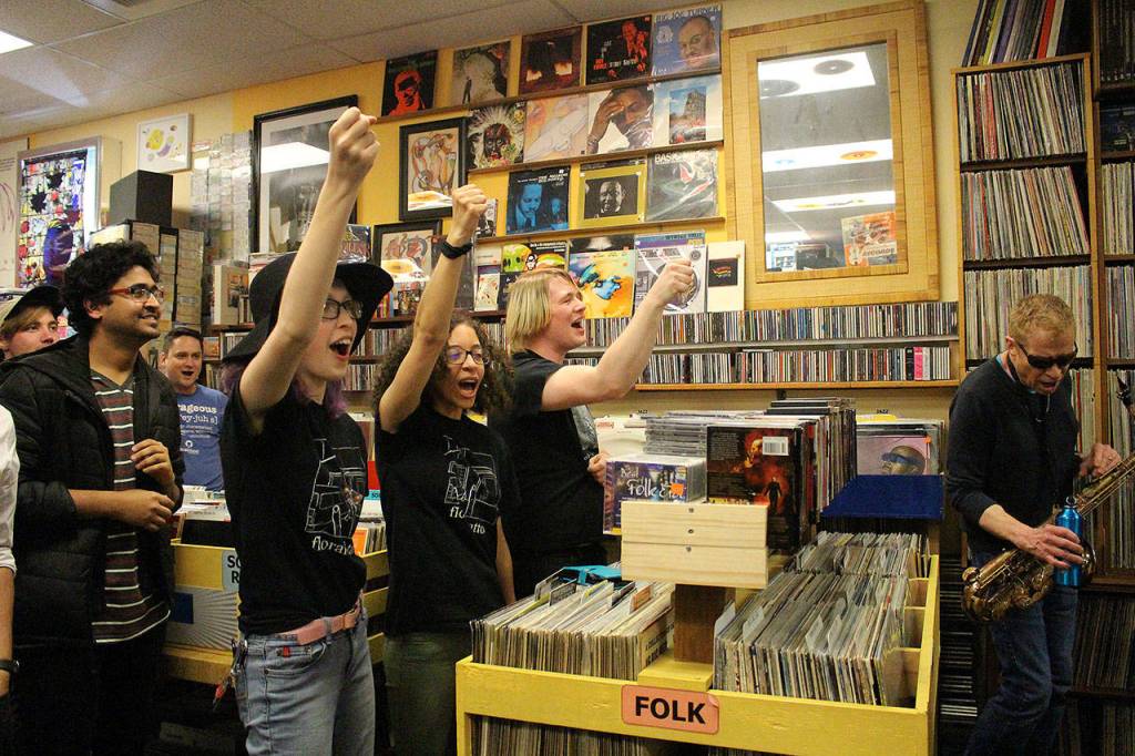 Rose Haskell, Meilani Eyre and Alex Palmer cheer on as Mister Blank performs. Madison Miller / staff photo