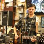 Elliot Austin performs an original song at Vortex on Record Store Day. Madison Miller / staff photo