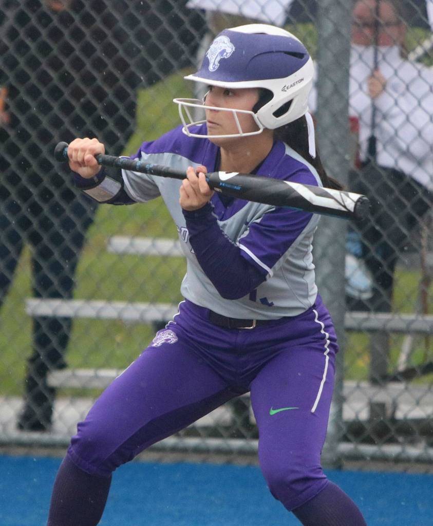 North Creeks Malia Pinder squares around to bunt. Andy Nystrom / staff photo
