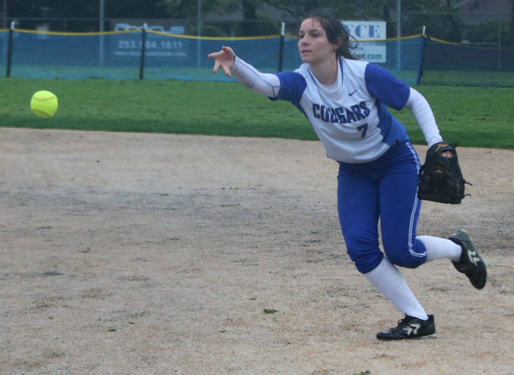 Bothells Reese McDonald throws a runner out at first. Andy Nystrom / staff photo