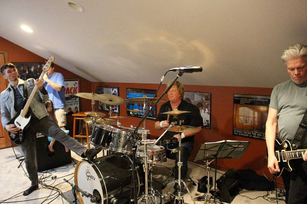 Nite Wave rehearses Rio by Duran Duran. From left: Michael Henrichsen, Evan Galt, Jeff Mills and Dave Dodge. Madison Miller / staff photo