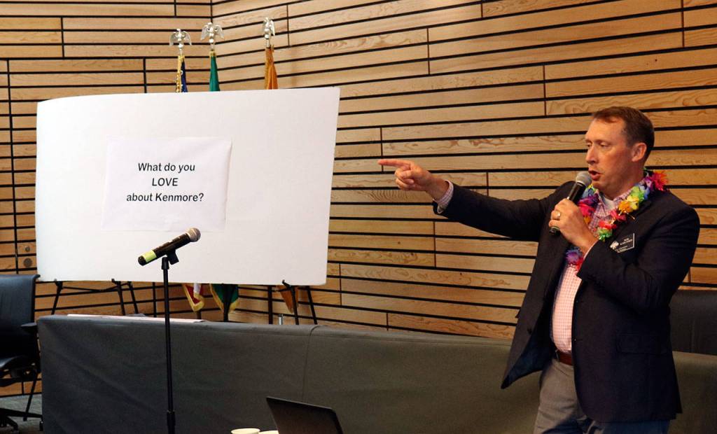Rob Karlinsey hosts the For the Love of Kenmore workshop, wearing a colorful lei along with other city staff members who volunteered their time to hear locals ideas. Kailan Manandic/staff photo
