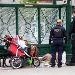 Redmond Police Officers and Kroll (not pictured) make contact with an individual sleeping at the downtown park and ride center. Ashley Hiruko/staff photo
