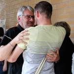 IHS Ted Christensen reconnects with old students at his surprise retirement celebration on June 9. Madison Miller / staff photo