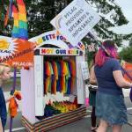 Members of PFLAG Bellevue Eastside march in this years Duvall Days parade earlier this month. Photo courtesy of Beth Lenholt