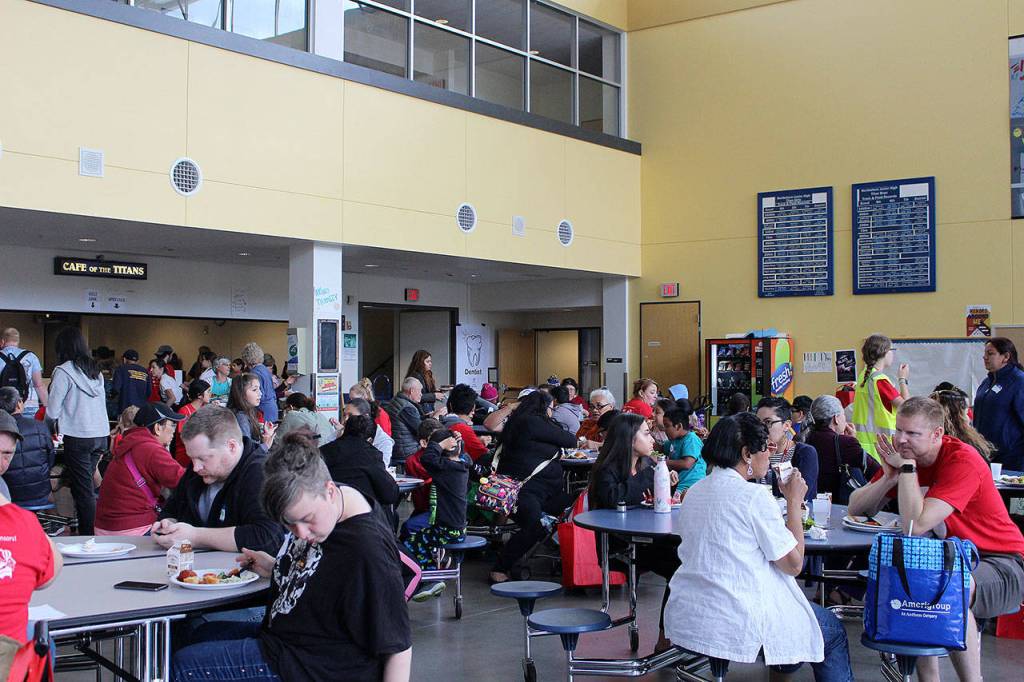 At Care Day, guests can receive services ranging from medical/dental care to housing and legal aid, including a free hot meal catered by Heritage Restaurant of Woodinville and The Pizza Coop. Madison Miller/staff photo