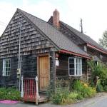 Right next door to the Ericksen House is the Carriage Barn, built in 1901. The barn was converted to an electrical repair shop in the 1940s until it was renovate for commercial use in the 1980s. Evan Pappas/staff photo