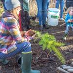 My job is awesome because I get to spend so much time outside. Here, Im planting a tree at a community event that I helped organize, Sophia says.