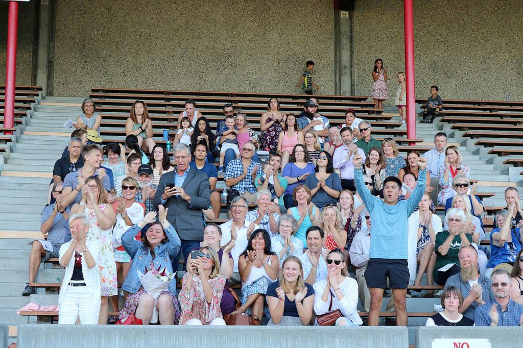 Attendees cheer for the new inductees at the Wall of Honor Ceremony at the Pop Keeney Stadium on Aug. 15. Stephanie Quiroz/staff photo