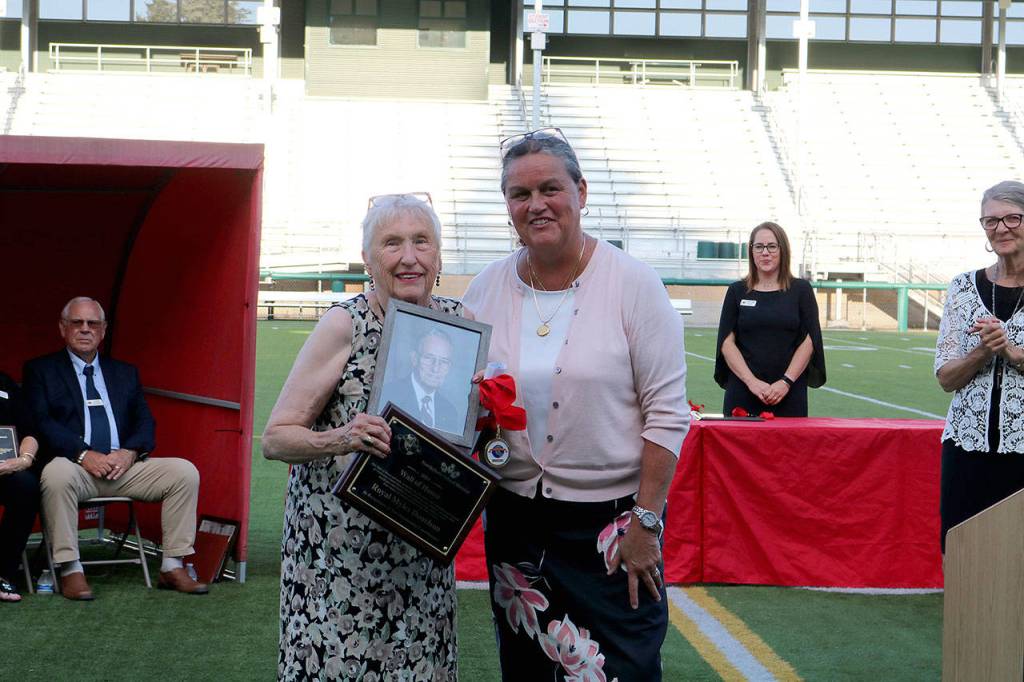 Royal Myles Doneslons wife receives his award. Donelson was Bothell High School Class of 1950. He was a recognized business owner, council mayor, and was very involved in his community. Donelson passed on Aug. 2005. Stephanie Quiroz/staff photo