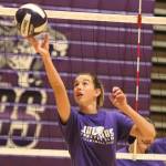 North Creek senior Allison Wilks gets in some net play during a recent practice. Andy Nystrom/ staff photo