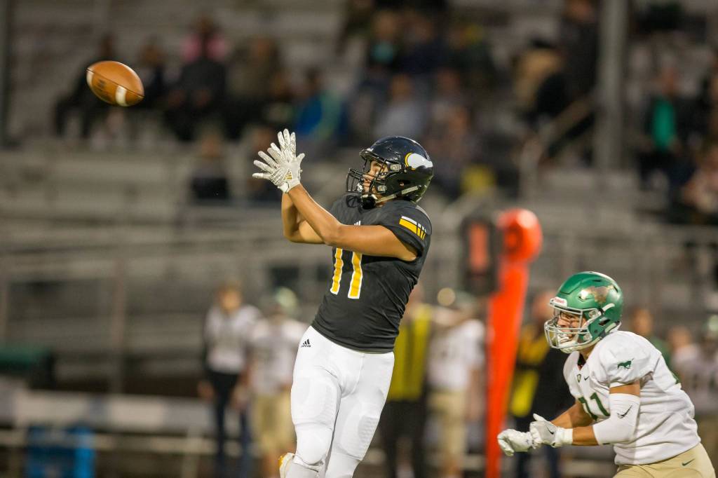 Raj Khanka hauls in a pass against Redmond. Photo courtesy of Jason Tanaka