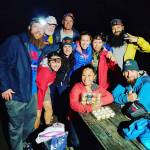 Photo courtesy of Naomi Layco                                 Members of the Mt. Baker expedition team surprise Naomi Layco (center) with cupcakes for her 33rd birthday, before their big climb.