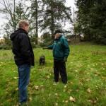 Jim Corcoran (right) talks to Ken Klein from the Snohomish County Executives Office about a small baseball field on his land in Bothell. Olivia Vanni/staff photo