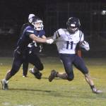 Cedar Park Christian wide receiver John Petrus tries to break a tackle during a 56-7 loss to Lynden Christian on Nov. 8. Photo courtesy of Hailey Palmer/Lynden Tribune