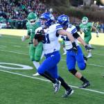 Bothells Ryan Metz returns a fumble for a touchdown in the 4A state semifinal against Woodinville. Photo courtesy of Greg Nelson