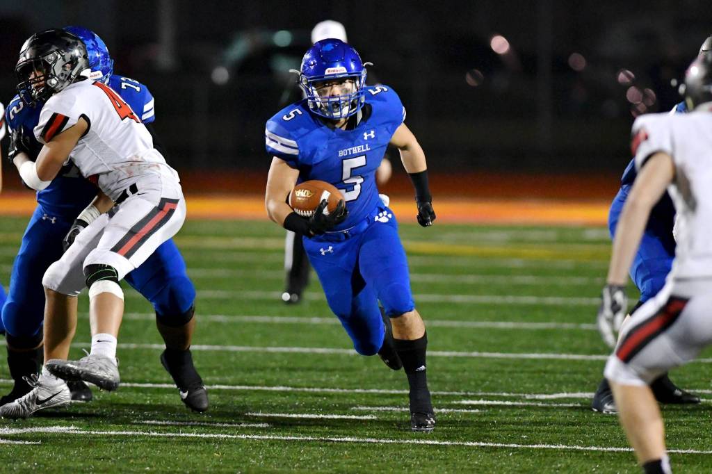 Christian Galvan finds a hole in the Camas defense. Photo courtesy of Greg Nelson