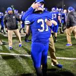 Ryan Metz receives a hug following the state championship game. Photo courtesy of Greg Nelson