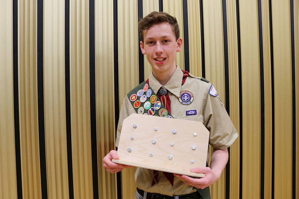 Spencer Hogge, 16, created close to 35 fine motor boards as his Eagle Scout Service Project for NSDs special education program. The nuts and bolts boards help students with their motor skills. Stephanie Quiroz
