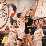 Inglemoor guard Brady Castro goes to the hoop during a 4A KingCo league tournament game on Jan. 8 at Sammamish High School. Benjamin Olson/staff photo