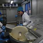 Employees at Rebellyous prepare plant-based chicken nugget dough. The company sells to commercial kitchens, and is hoping to expand in the coming year. Aaron Kunkler/staff photo