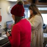 Members of Swedish Issaquah Campuss staff register patients at the drive-by COVID-19 testing site. The testing site is being supported by a Medical Teams International, which converted one of its mobile dental clinics into a command center for the site. Photo courtesy of Medical Teams International
