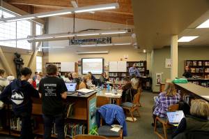 Staff at Canyon Park Middle School in Bothell receive training, March 5, 2020, on online learning options. Now the return to school in the fall is planned to also be online-only. (Courtesy Northshore School District)