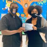 Classic Eats Restaurant owner Tony Hayes distributing gift certificates to Highline School District staff. Hayes is one of many King County residents that have been giving back during this time of need in 2020. Courtesy photo/Tony Hayes.